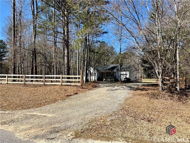 view of road with driveway