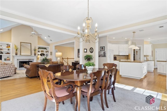 dining room featuring recessed lighting and light wood-style flooring