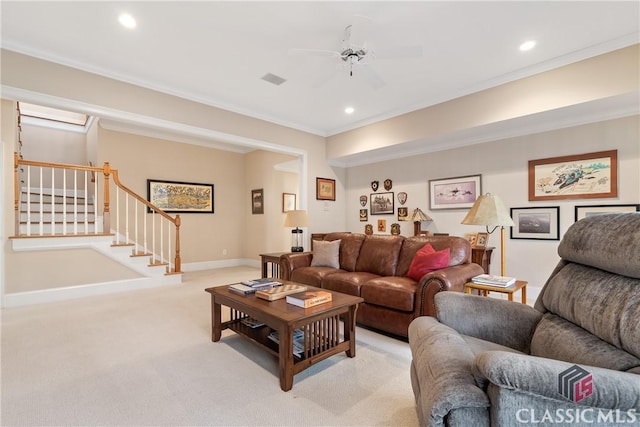 living room with light carpet, a ceiling fan, and recessed lighting