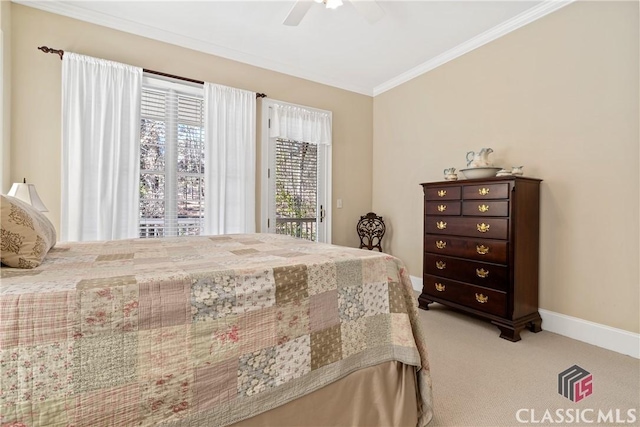 carpeted bedroom with crown molding, a ceiling fan, baseboards, and access to exterior