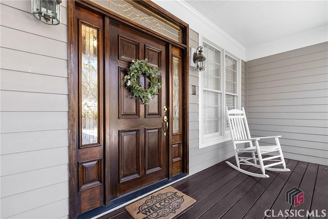 entrance to property with covered porch