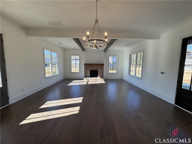 88 Morrison St Unit 56, Watkinsville, GA 30677 - unfurnished living room featuring beamed ceiling, visible vents, baseboards, a notable chandelier, and dark wood-style floors