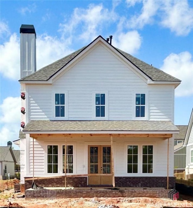 1380 Melody Bnd Unit 45, Watkinsville, GA 30677 - rear view of house with brick siding, french doors, a shingled roof, and covered porch