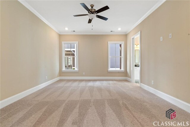 1380 Melody Bnd Unit 45, Watkinsville, GA 30677 - empty room featuring ornamental molding, baseboards, a ceiling fan, and light colored carpet