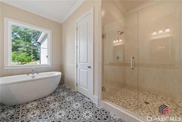 1380 Melody Bnd Unit 45, Watkinsville, GA 30677 - bathroom featuring a shower stall, tile patterned floors, and a freestanding tub