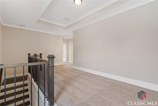 1380 Melody Bnd Unit 45, Watkinsville, GA 30677 - interior space featuring baseboards, ornamental molding, light carpet, visible vents, and a tray ceiling