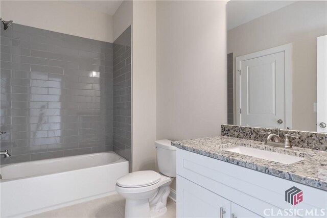 1380 Melody Bnd Unit 45, Watkinsville, GA 30677 - bathroom with toilet, vanity, shower / bathing tub combination, and tile patterned flooring
