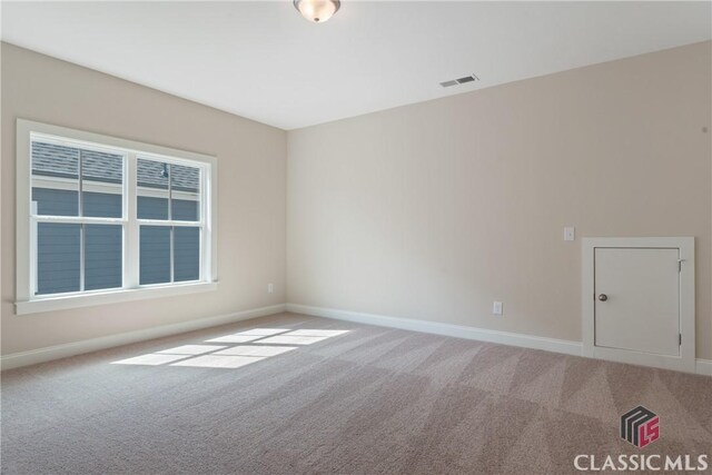 1380 Melody Bnd Unit 45, Watkinsville, GA 30677 - empty room with visible vents, baseboards, and carpet floors
