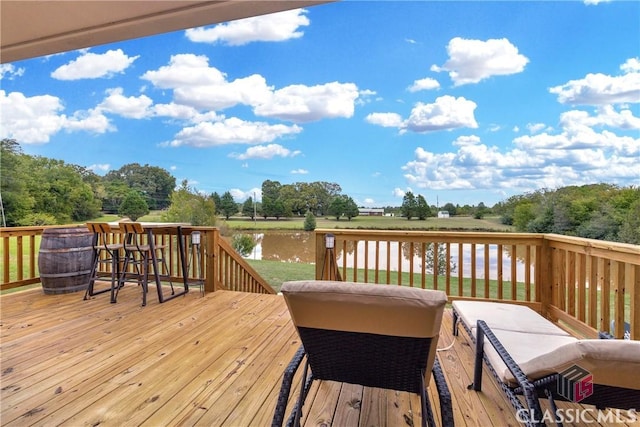 deck featuring a water view