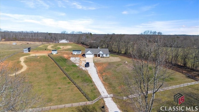 birds eye view of property with a rural view