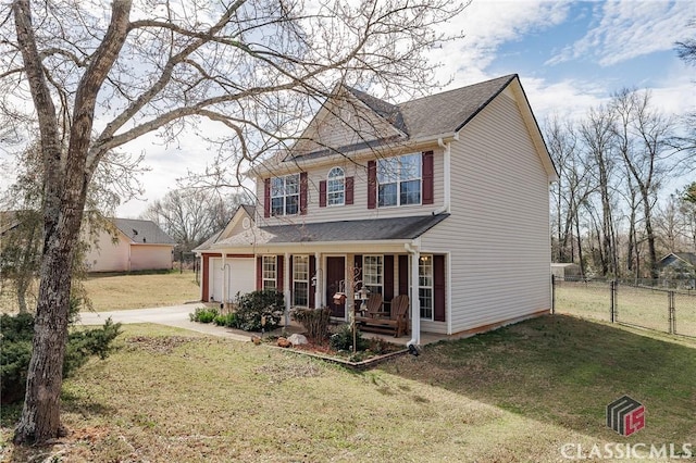 view of front of property with a garage, concrete driveway, covered porch, fence, and a front lawn