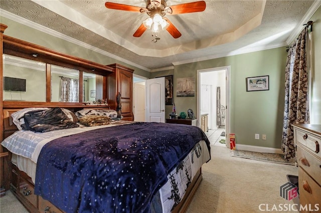 bedroom featuring a raised ceiling, light carpet, crown molding, and a textured ceiling