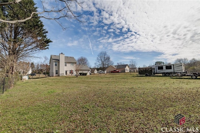 view of yard featuring fence