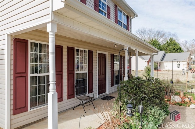 entrance to property with a porch