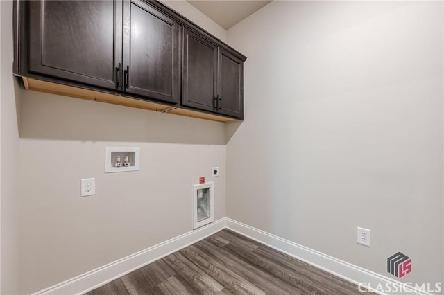 clothes washing area featuring baseboards, washer hookup, dark wood-style flooring, hookup for an electric dryer, and cabinet space