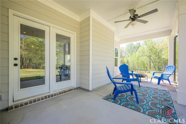 view of patio / terrace featuring french doors and ceiling fan