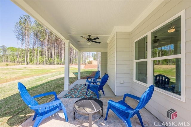 view of patio / terrace with a ceiling fan