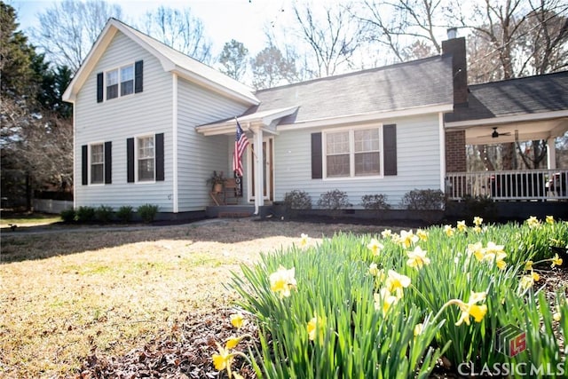 view of front of property featuring a chimney