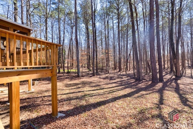 view of yard featuring a deck