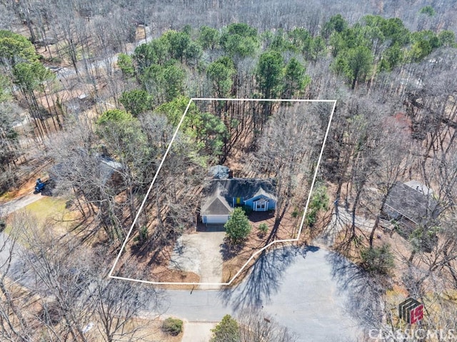 aerial view featuring a forest view