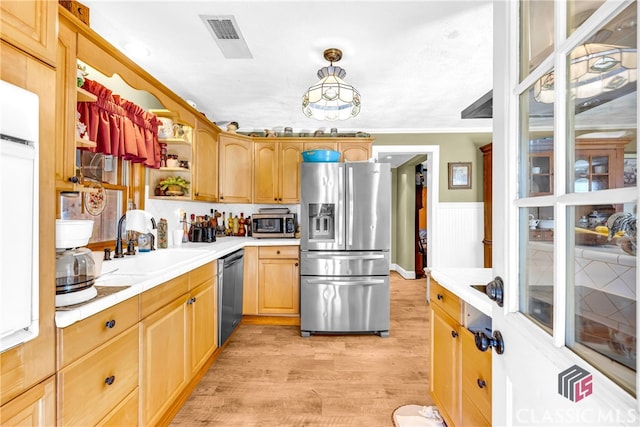 kitchen with stainless steel appliances, a sink, visible vents, open shelves, and light wood finished floors