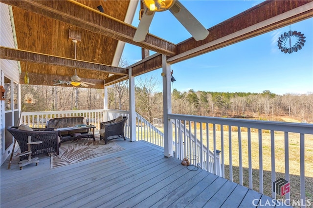 wooden terrace with ceiling fan