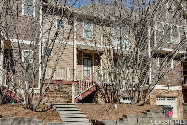 view of building exterior featuring stairway