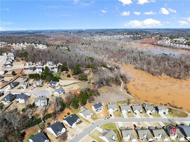 birds eye view of property with a residential view