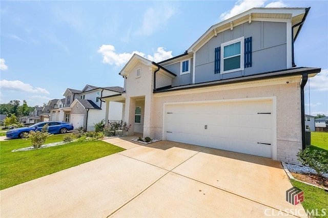 view of front of property with a garage, a front yard, concrete driveway, and a residential view