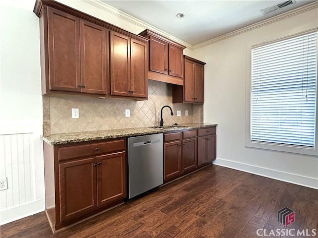 kitchen with dark wood-style flooring, a sink, visible vents, light stone countertops, and dishwasher