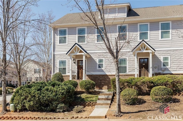 view of front of property featuring brick siding