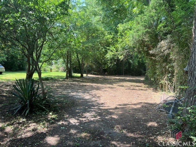 exterior space with a view of trees