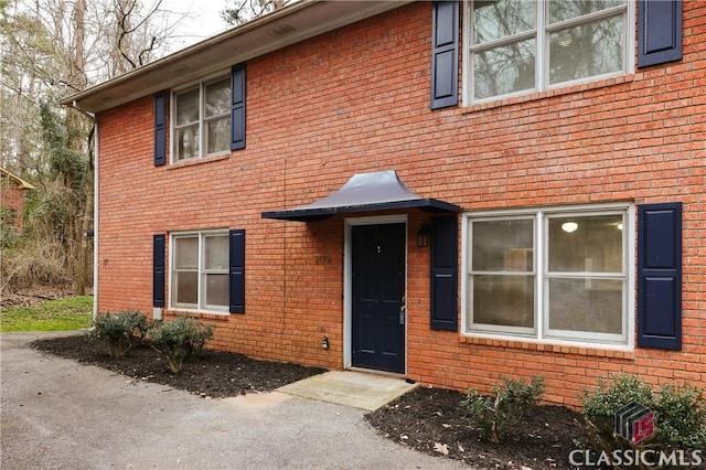 view of front of property with brick siding