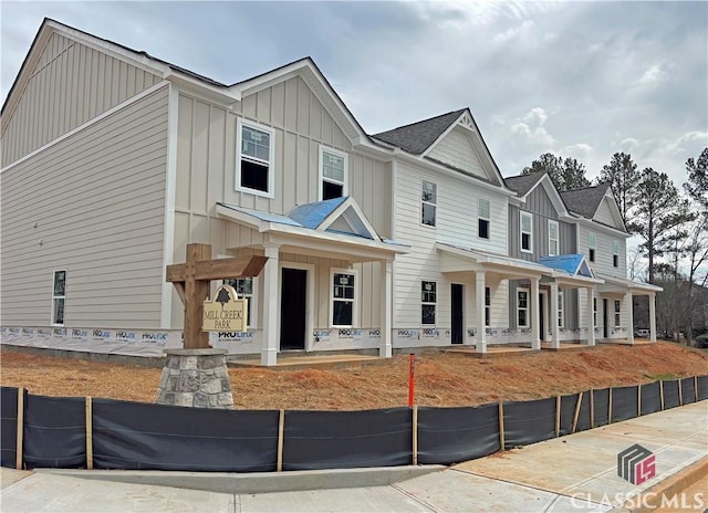 view of front of property featuring covered porch and board and batten siding