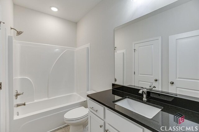 full bathroom with toilet, bathtub / shower combination, and vanity