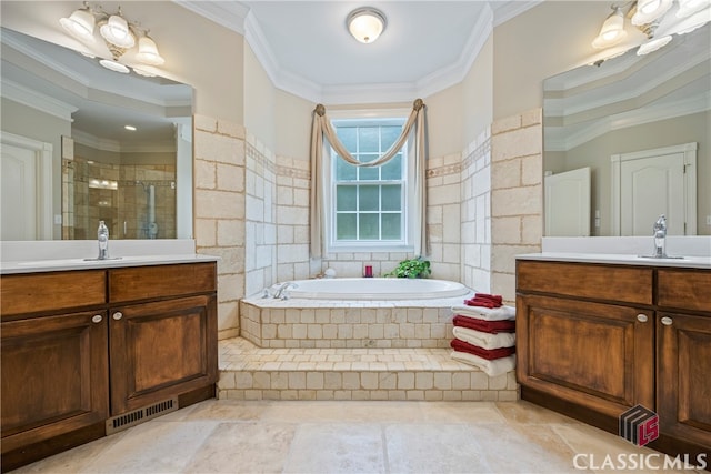 bathroom featuring visible vents, ornamental molding, a sink, a shower stall, and a bath