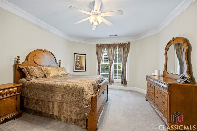 bedroom featuring light carpet, visible vents, and ornamental molding