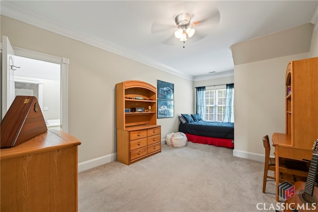 bedroom with ornamental molding, light carpet, and baseboards