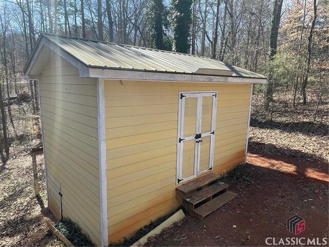 view of shed featuring entry steps