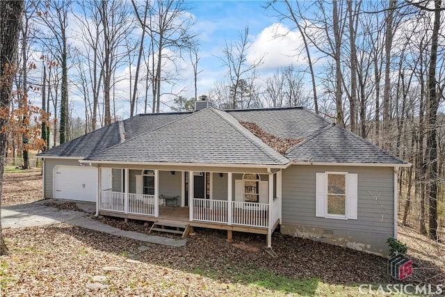 single story home featuring a porch, a shingled roof, a chimney, concrete driveway, and crawl space