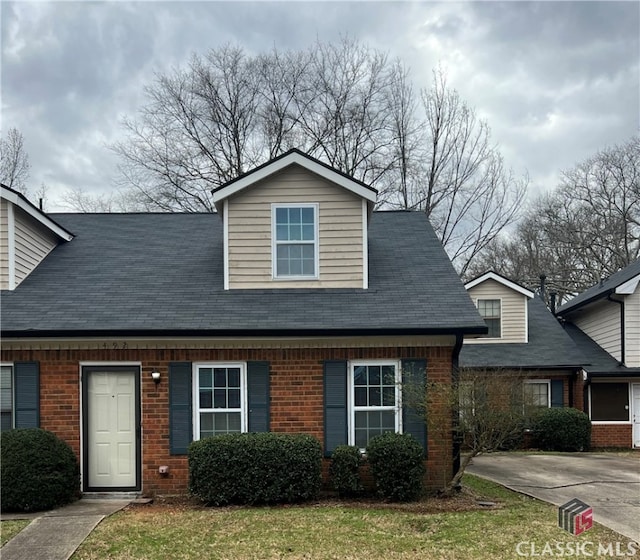 view of front of property with brick siding