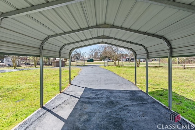 view of vehicle parking featuring a carport