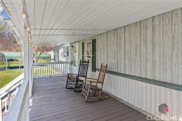 wooden terrace with covered porch