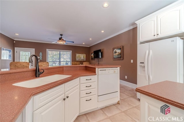 kitchen featuring recessed lighting, ceiling fan, a sink, and white appliances