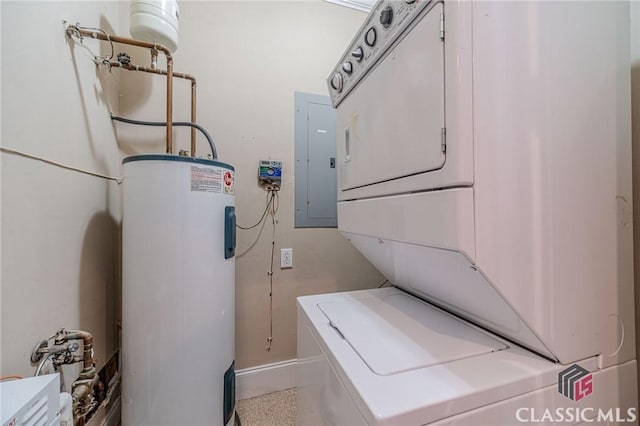washroom with electric water heater, stacked washing maching and dryer, electric panel, baseboards, and laundry area