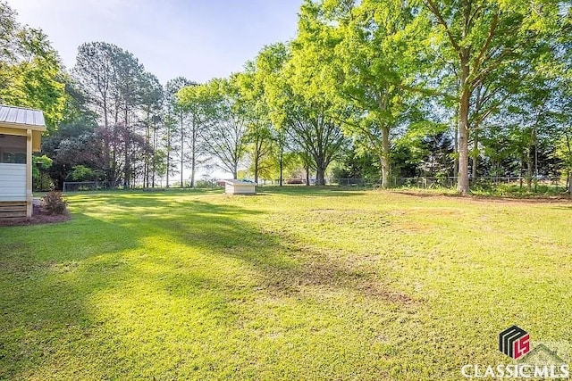 view of yard with fence