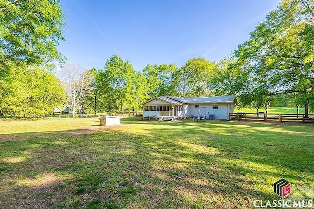 view of yard featuring fence