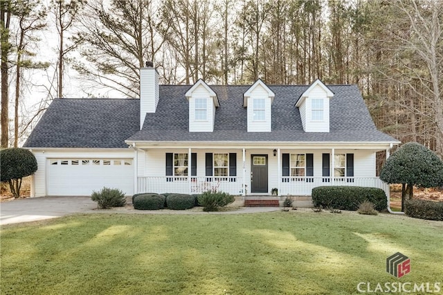 cape cod house featuring a garage, covered porch, concrete driveway, and a front lawn