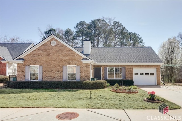 view of front of home featuring brick siding, driveway, and a front lawn