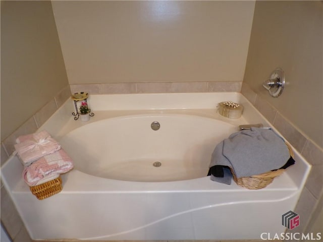 bathroom featuring a garden tub